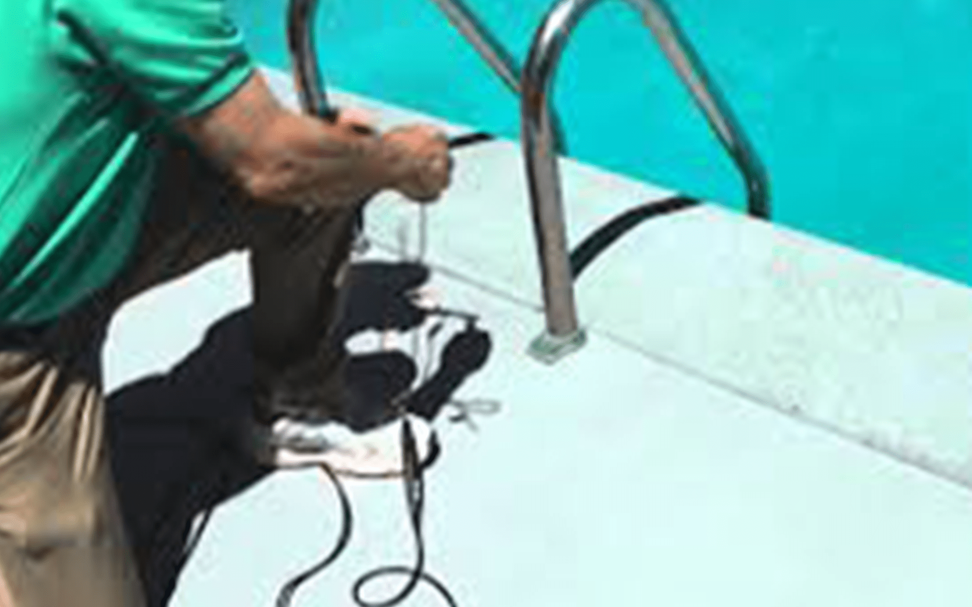 Electrician inspecting the electrical connection